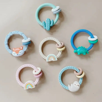 RITZY RATTLE SILICONE TEETHER RATTLES - DINO